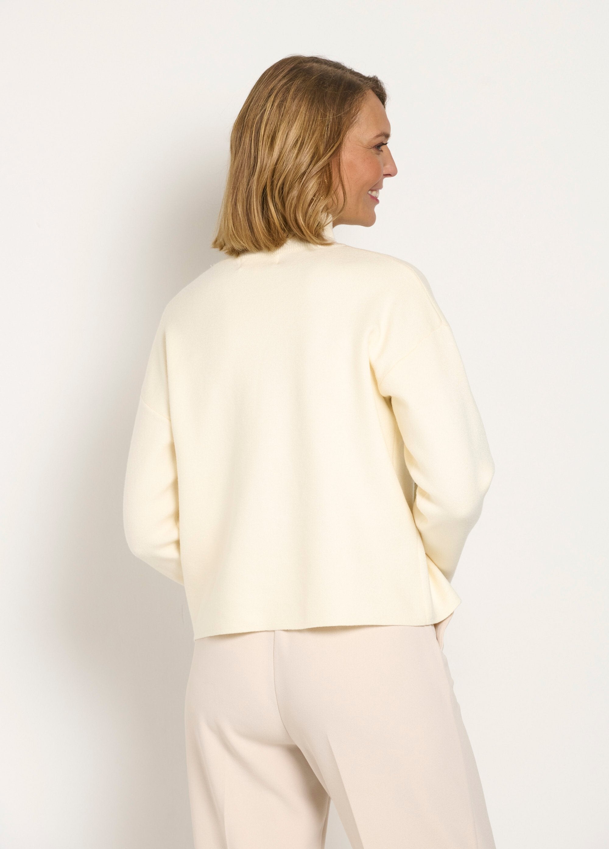 High-neck_sweater_with_sequined_flower_embroidery_Beige_DO1_slim